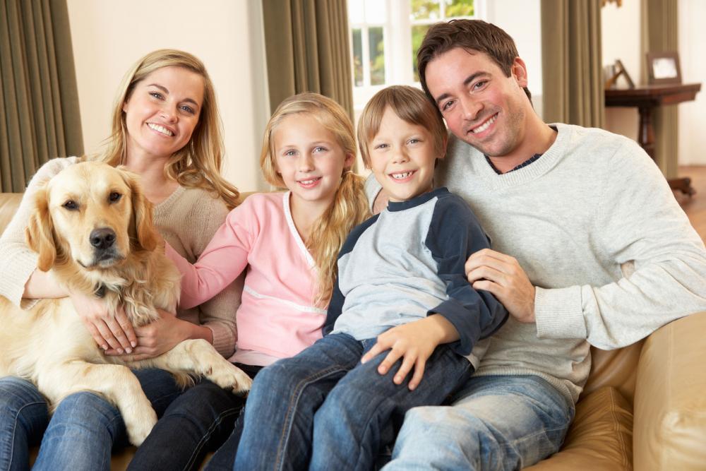 Family happy to have their pet healthy.